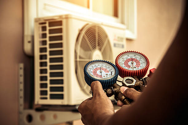 Professional Emergency Hvac technician working in South Easton, MA